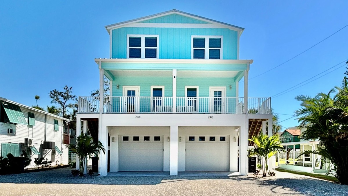 Front view of the blue Docked at Dakota duplex