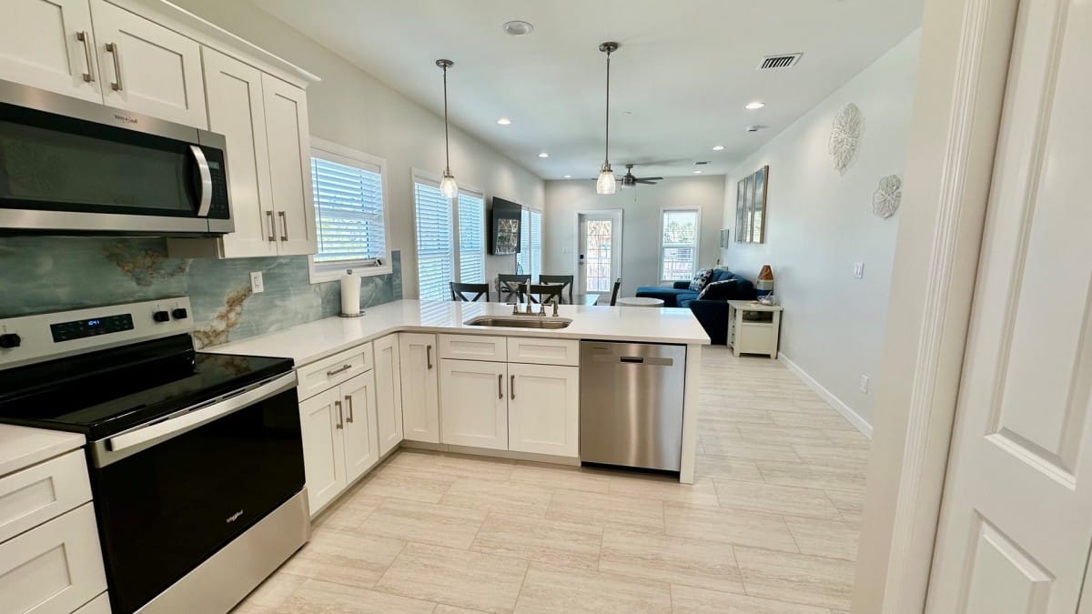 Open kitchen and dining layout with full-size appliances