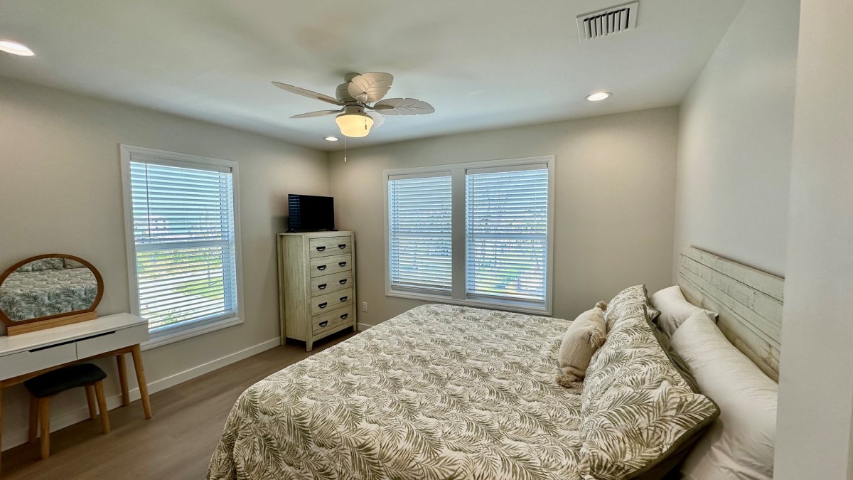 Primary bedroom with coastal bedding